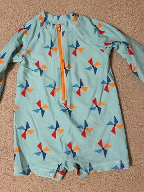 Primary Bundle- Light Blue Pinwheel Zip-Up Rashguard with Orange Trim & Hat